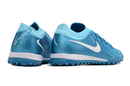 Chuteira Society Nike Phantom GX 2 Elite TF Azul "Mad Ambition Pack" - Futx Brasil